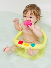 Cute baby girl in a bath