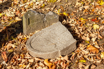 forgotten and unkempt Jewish cemetery with the strangers
