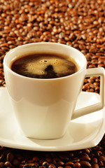 Composition with white cup of coffee