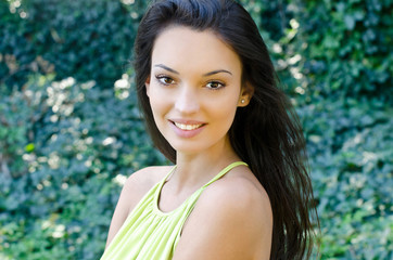 Naklejka premium Girl with beautiful teeth and long hair, smiling