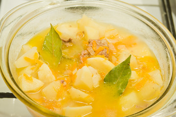 preparation of meal on a gas stove