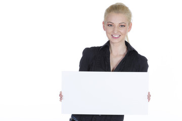 Fototapeta premium Sympathische Blonde zeigt ein rechteckiges Schild vorne