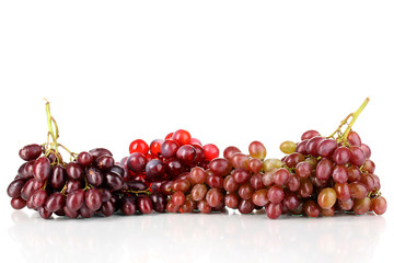 Delicious ripe grapes isolated on white