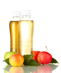 two bottles of juice with sweet apples, isolated on white