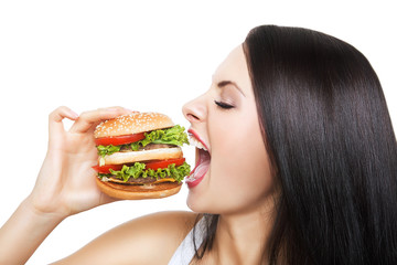 girl biting hamburger