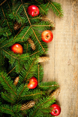 christmas fir tree with pinecones and apples