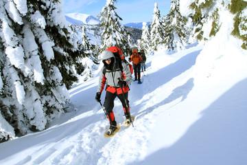 Winter hiking in snowshoes.