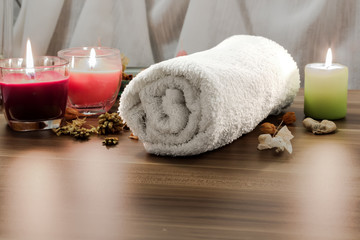 Obraz na płótnie Canvas Towel, aromatic candles and other spa objects