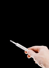 thermometer in hand isolated on white