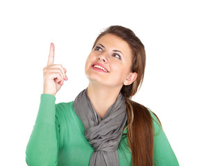 A young woman pointing at something
