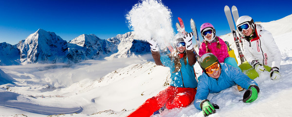 Ski, snow, sun and winter fun - happy family ski team - obrazy, fototapety, plakaty