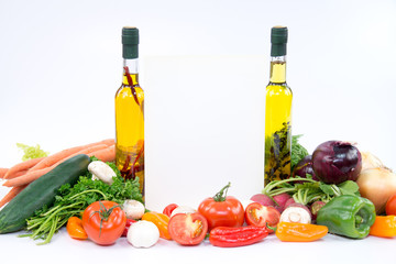 Papre for recipes between olive oil bottles and vegetable