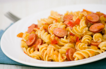Fusilli pasta with smoked sausage and vegetables