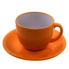 orange cup and saucer