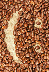 Coffee beans in the form of a smiling face