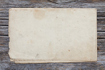 Vintage page on a wooden wall