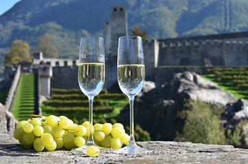 Pair of champagne glasses and grapes. Bellinzona, Switzerland