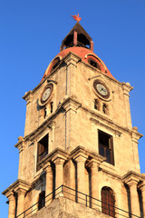 Fototapeta premium Corner of clock tower in sunset