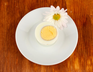 Boiled egg on color background