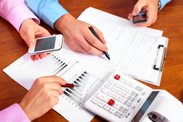 Hands of accountant business woman.