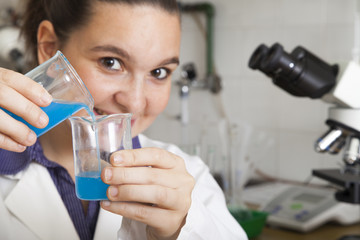 Closeup of a cute smiling female researcher