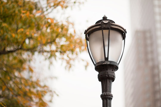 Fototapeta Classic street lantern in modern city