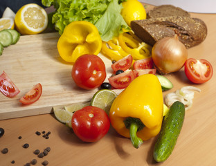 peppers surrounded by vegetables