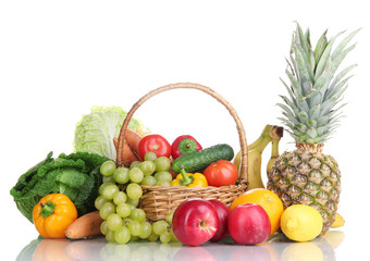 Composition with vegetables and fruits in wicker basket