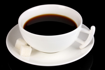 A cup of strong coffee isolated on black