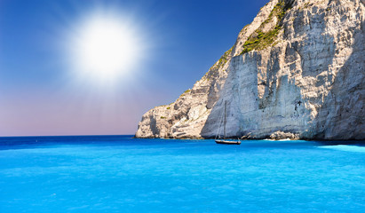 Fototapeta premium view of Navagio beach in Greece with cruiser anchoring