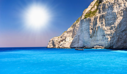 view of Navagio beach in Greece with cruiser anchoring