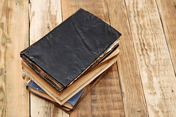 Vintage old books on wooden table