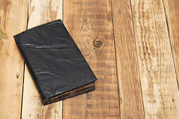 antique book on wood  on wooden table