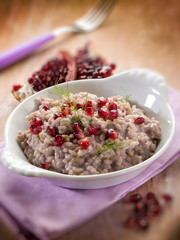 risotto with pomegranate, selective focus
