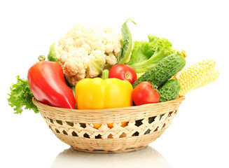 Fresh vegetables in basket isolated on white