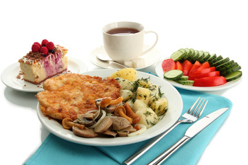 Roast chicken cutlet with boiled potatoes and  vegetables, cup