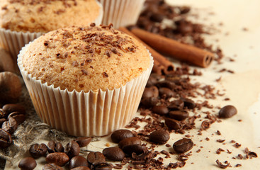 tasty muffin cakes with chocolate, spices and coffee seeds,