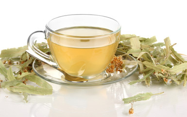 Glass cup of tea with linden isolated on white