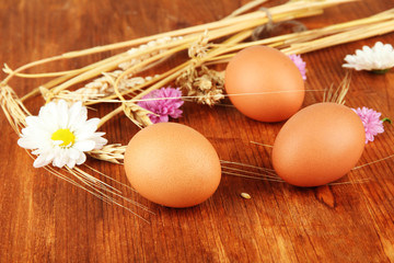 Boiled eggs on wooden background
