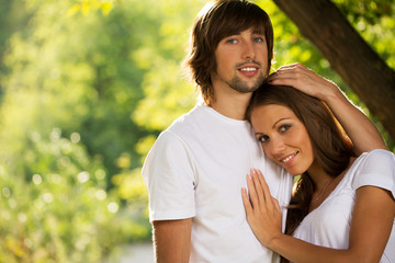 Fototapeta premium Young attractive couple together outdoors