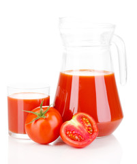 Tomato juice in pitcher and glass isolated on white