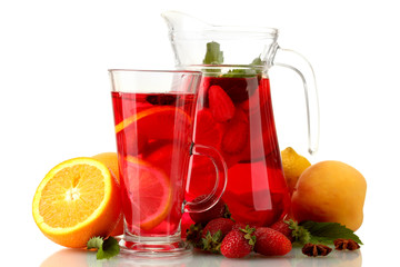 sangria in jar and glass with fruits, isolated on white