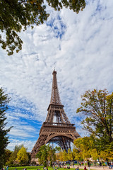 Eiffel Tower against the blue sky and clouds. Paris. France