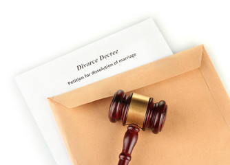 Divorce decree and envelope on white background