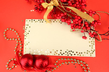 beautiful bright Christmas balls and empty postcard