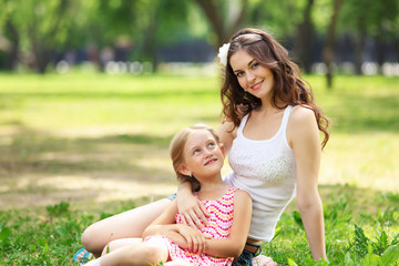 Mother and daughter in the park