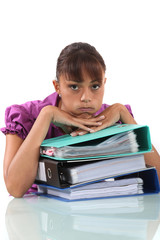 overwhelmed secretary sitting on her desk