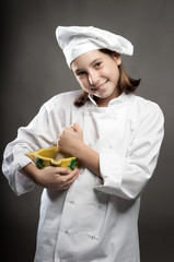 young chef  holding a mortar