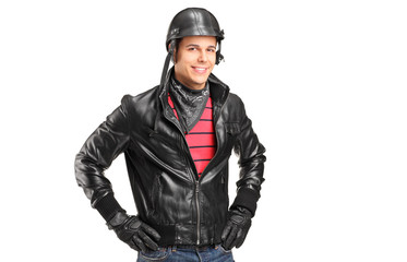 A motorcycler with helmet posing