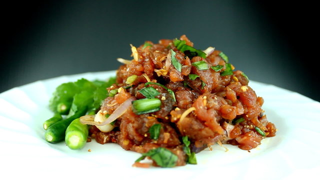 Larb pork on a plate. Traditional Thai food